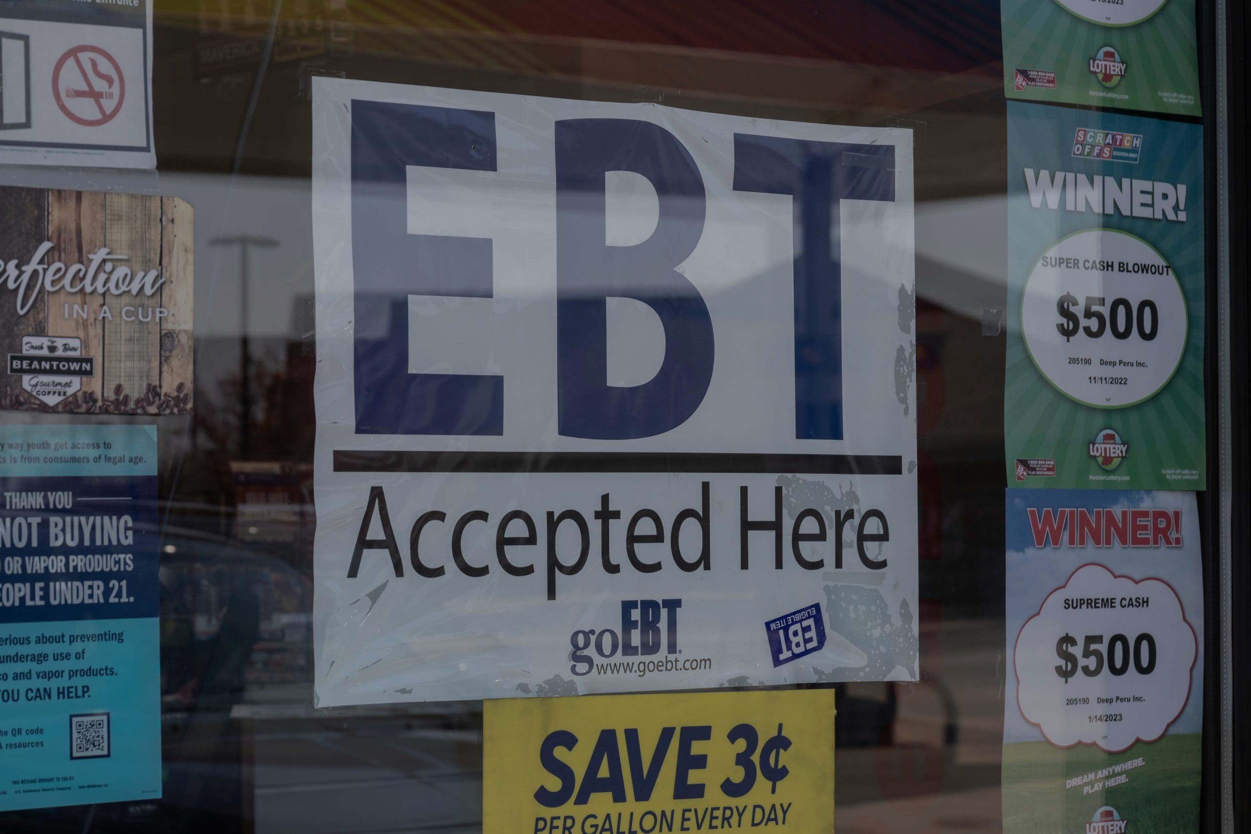 Exterior of a grocery story that is advertising that they accept EBT